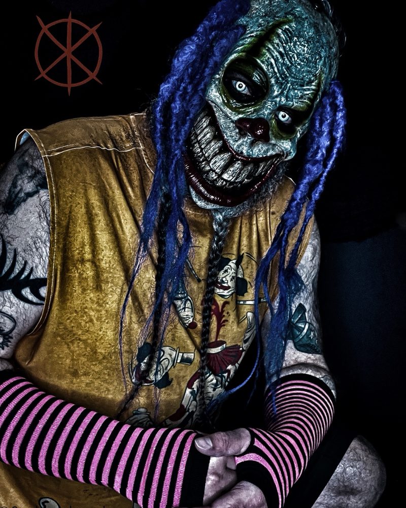 Colorful sinister clown mask portrait